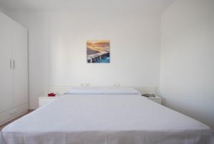 Posteľ alebo postele v izbe v ubytovaní Hostal Mayans