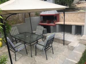 En terrasse eller udendørsområde på VALENTINA LUXURY