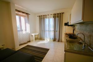 A cozinha ou cozinha compacta de Summer Residence Bunte