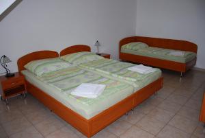 A bed or beds in a room at Rider Beach