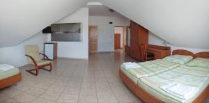 A bed or beds in a room at Rider Beach