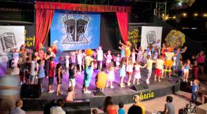 a group of people standing on a stage at Ephesia Holiday Beach Club in Kuşadası +37 photos