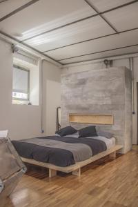 a bedroom with a large bed in a room at CasaMia in Rome