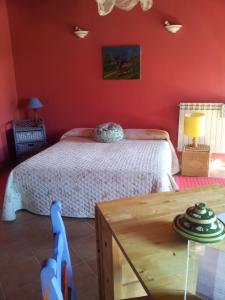 Postel nebo postele na pokoji v ubytování B&B Il Pioppo E La Fonte