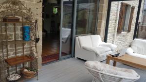 Posezení v ubytování le jardin des chênes