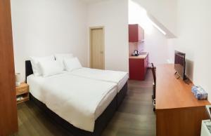 Postel nebo postele na pokoji v ubytování Apartment De Luna