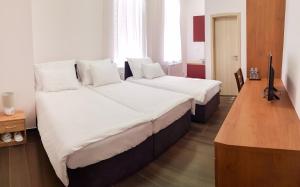 Postel nebo postele na pokoji v ubytování Apartment De Luna