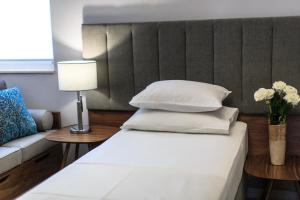 Postel nebo postele na pokoji v ubytování Regina del Mare