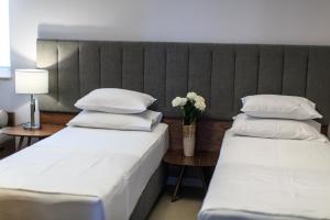 Postel nebo postele na pokoji v ubytování Regina del Mare