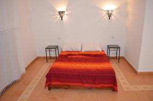 Letto o letti in una camera di Casa Naima