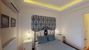 Rúm í herbergi á Hotel Mirto