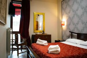 Postel nebo postele na pokoji v ubytování B&B Muro Torto Lucera