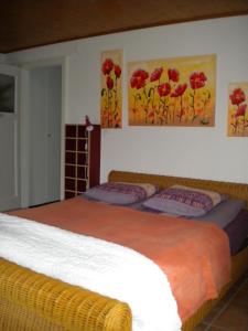 Säng eller sängar i ett rum på Appartement La Coudraie