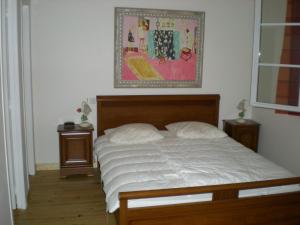 Ένα ή περισσότερα κρεβάτια σε δωμάτιο στο LA VIGNERAIE