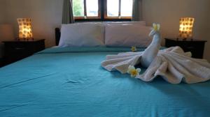 Cama o camas de una habitación en Hotel Suma