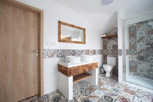 Koupelna v ubytování Penzion Šarlota & Vinařství Vítek Josef