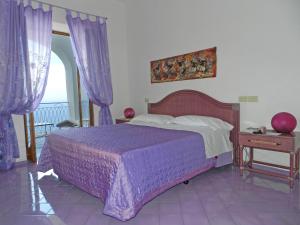 Postel nebo postele na pokoji v ubytování Hotel Holiday