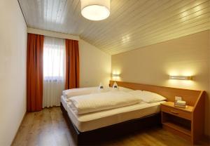 Katil atau katil-katil dalam bilik di Apartments Schneider