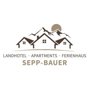 a logo for a home appliances serp broker at Landhotel - Apartments Bauer in Hintergöriach
