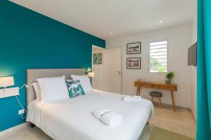 Voodi või voodid majutusasutuse Villas Rock & Beach toas