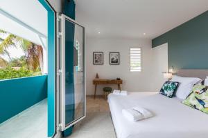 Voodi või voodid majutusasutuse Villas Rock & Beach toas