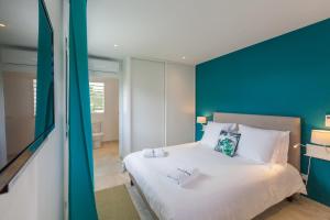 Voodi või voodid majutusasutuse Villas Rock & Beach toas