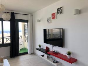 TV in/ali zabaviščno središče v nastanitvi APARTAMENTO CHAO PORTONOVO