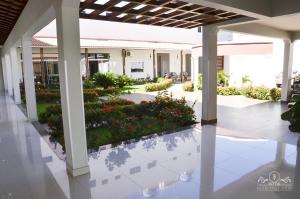 a view of the courtyard of a building at Hotel das Torres in Guanambi