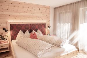 Posteľ alebo postele v izbe v ubytovaní Penthouse Chalet Pichlerhof