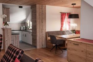 Kuchyňa alebo kuchynka v ubytovaní Penthouse Chalet Pichlerhof