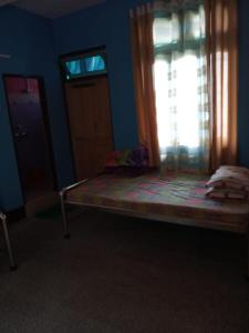 Postel nebo postele na pokoji v ubytování VAMOOSE CHAMLING