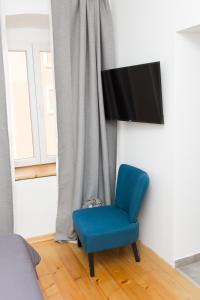 TV a/nebo společenská místnost v ubytování Apartments and Rooms Ille