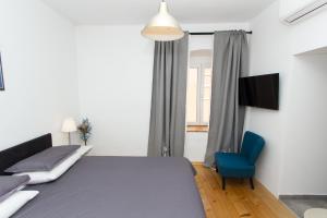 TV a/nebo společenská místnost v ubytování Apartments and Rooms Ille
