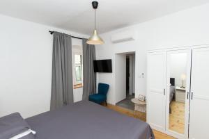 TV a/nebo společenská místnost v ubytování Apartments and Rooms Ille