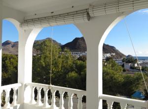 a view of the mountains from the balcony of a house at Balcon de San Jose in San José