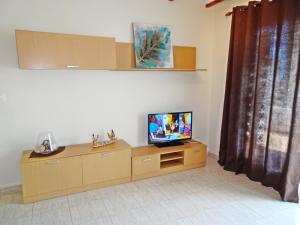 Telewizja i/lub zestaw kina domowego w obiekcie SAFOR GANDIA - Alquiler solo Familias