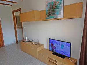 Telewizja i/lub zestaw kina domowego w obiekcie SAFOR GANDIA - Alquiler solo Familias