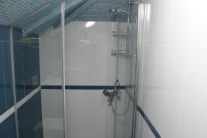 Koupelna v ubytování Hotel Lion