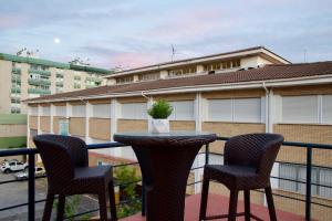 A balcony or terrace at MalagaUrbanRooms - Beach & Sea