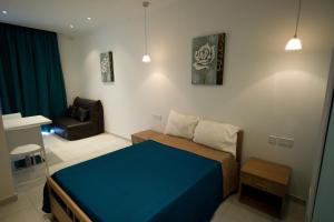 Llit o llits en una habitació de Harbour Lodge