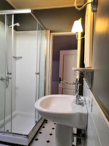 a bathroom with a sink and a shower at Apartments Gabri in Mali Lošinj +31 photos