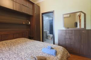 Ένα ή περισσότερα κρεβάτια σε δωμάτιο στο Guest House Eka & Gio