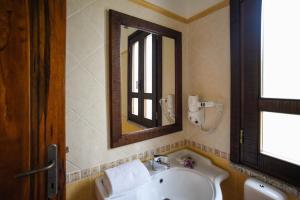 Koupelna v ubytování Hotel Funtana Ena + 37 fotografií