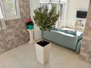 Posteľ alebo postele v izbe v ubytovaní Vonitsa Loft Apartment 1