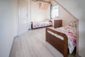 Posteľ alebo postele v izbe v ubytovaní Domek Skowronek