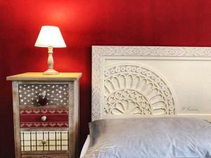 A bed or beds in a room at Il Fienile di Assisi