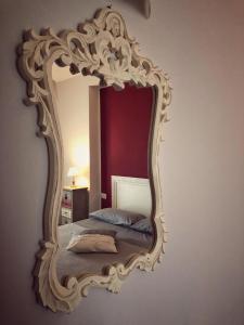 A bed or beds in a room at Il Fienile di Assisi