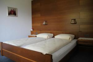 מיטה או מיטות בחדר ב-Haus Mader