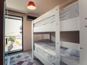 Postel nebo postele na pokoji v ubytování Sofia Beach Residence