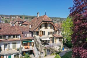 Galería fotográfica de Magnifique maison vigneronne avec grand jardin en Auvernier